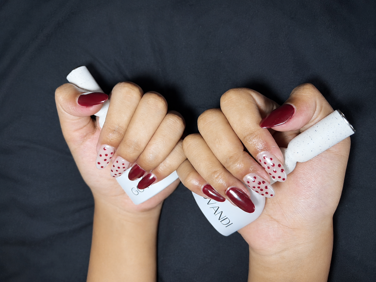 Deep red gel, dotted accent nail